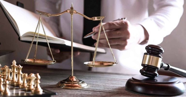 gavel on wooden table and lawyer or judge working with agreement in courtroom theme 1